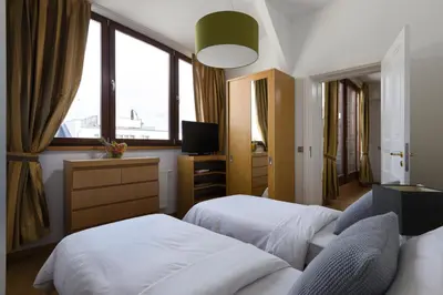 Ein Bett oder Betten in einem Zimmer der Unterkunft Luxoise Apartments