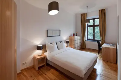 Ein Bett oder Betten in einem Zimmer der Unterkunft Luxoise Apartments