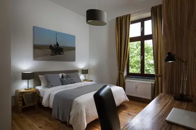 Ein Bett oder Betten in einem Zimmer der Unterkunft Luxoise Apartments