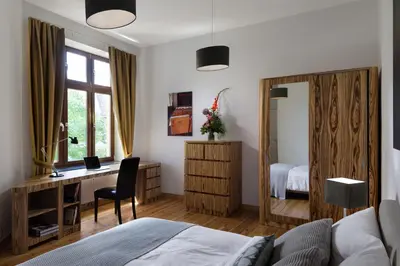 Ein Bett oder Betten in einem Zimmer der Unterkunft Luxoise Apartments