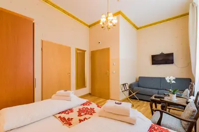 Ein Bett oder Betten in einem Zimmer der Unterkunft Arbio I Parlamento Rooms near Schonhauser Allee