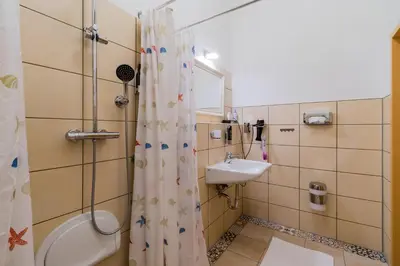 Ein Badezimmer in der Unterkunft Arbio I Parlamento Rooms near Schonhauser Allee