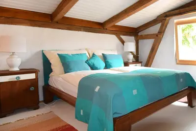 Ein Bett oder Betten in einem Zimmer der Unterkunft Villa Veda