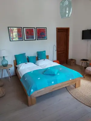 Ein Bett oder Betten in einem Zimmer der Unterkunft Villa Veda