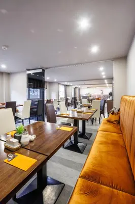 Ein Sitzbereich in der Unterkunft Hotel Lützow