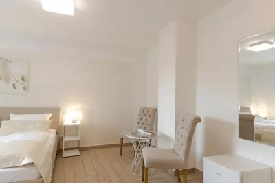 Ein Bett oder Betten in einem Zimmer der Unterkunft Pension am See