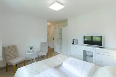 Ein Bett oder Betten in einem Zimmer der Unterkunft Pension am See