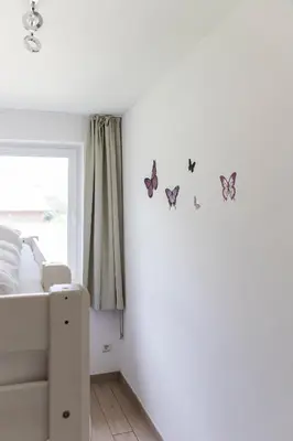 Ein Bett oder Betten in einem Zimmer der Unterkunft Pension am See