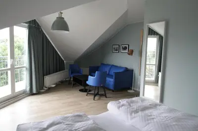 Ein Bett oder Betten in einem Zimmer der Unterkunft Havelhotel
