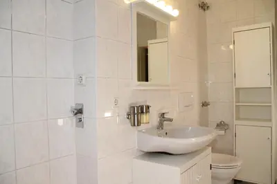 Ein Badezimmer in der Unterkunft Havelhotel