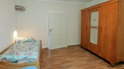 Ein Bett oder Betten in einem Zimmer der Unterkunft Mirabellenhof-Fewo mit Terrasse