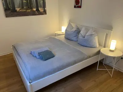 Ein Bett oder Betten in einem Zimmer der Unterkunft Ferienappartements am See