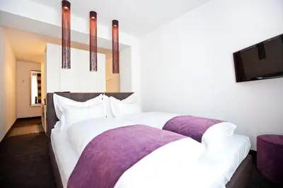 Ein Bett oder Betten in einem Zimmer der Unterkunft Goodman's Living