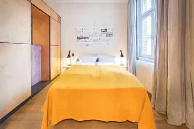 Ein Bett oder Betten in einem Zimmer der Unterkunft Design Apartments - 