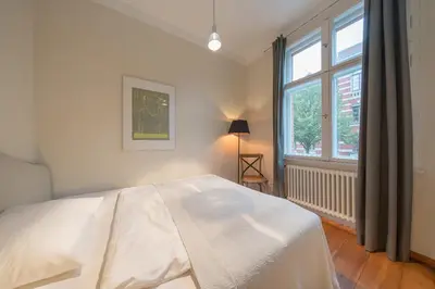 Ein Bett oder Betten in einem Zimmer der Unterkunft Design Apartments - 
