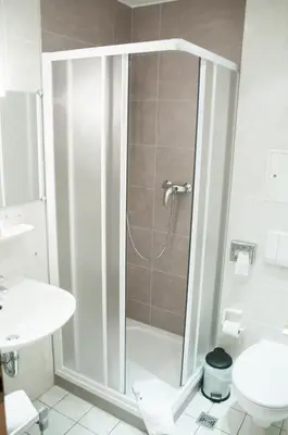 Ein Badezimmer in der Unterkunft Hotel 