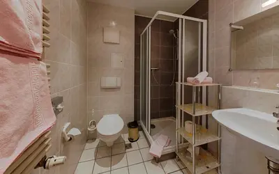 Ein Badezimmer in der Unterkunft Hotel 