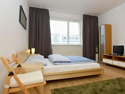 Ein Bett oder Betten in einem Zimmer der Unterkunft BearlinCity Apartments - City Center West