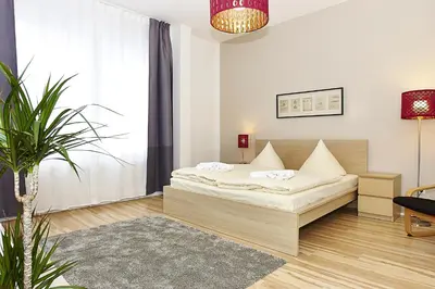 Ein Bett oder Betten in einem Zimmer der Unterkunft BearlinCity Apartments - City Center West