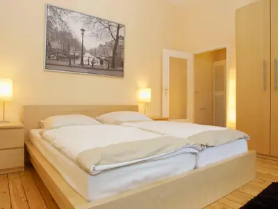 Ein Bett oder Betten in einem Zimmer der Unterkunft BearlinCity Apartments - City Center West