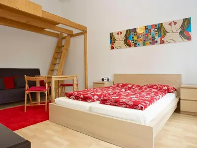 Ein Bett oder Betten in einem Zimmer der Unterkunft BearlinCity Apartments - City Center West