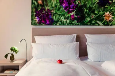 Ein Bett oder Betten in einem Zimmer der Unterkunft Landgut Stober
