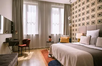 Ein Bett oder Betten in einem Zimmer der Unterkunft The Posthouse Berlin Potsdamer Platz- Leonardo Limited Edition