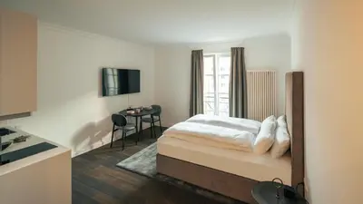 Ein Bett oder Betten in einem Zimmer der Unterkunft Bob W Berlin Mitte