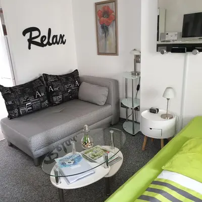 Ein Sitzbereich in der Unterkunft Ferienapartment MOHNBLUME