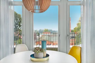 Ein Balkon oder eine Terrasse in der Unterkunft Park Penthouses Insel Eiswerder by Suite030