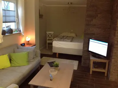 Ein Bett oder Betten in einem Zimmer der Unterkunft FeWo Buchheim, hochwertig und gemütlich, 5min zur S-Bahn
