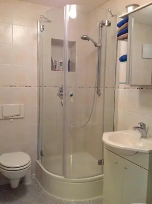 Ein Badezimmer in der Unterkunft FeWo Buchheim, hochwertig und gemütlich, 5min zur S-Bahn