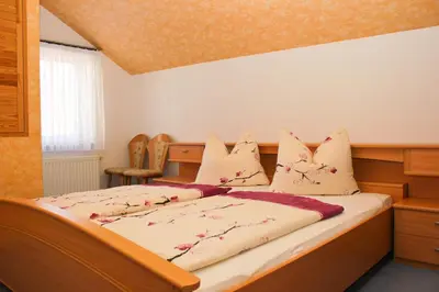 Ein Bett oder Betten in einem Zimmer der Unterkunft An der Hainmühle