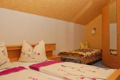 Ein Bett oder Betten in einem Zimmer der Unterkunft An der Hainmühle