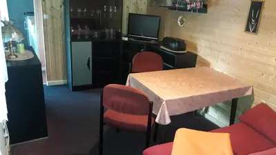 Ein Sitzbereich in der Unterkunft Mobile-Home