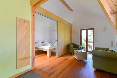 Ein Bett oder Betten in einem Zimmer der Unterkunft Dreigärten Brodowin