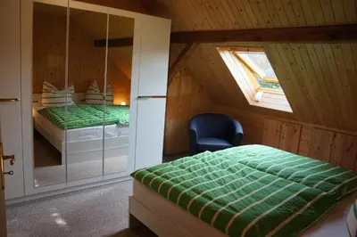 Ein Bett oder Betten in einem Zimmer der Unterkunft Schorfheider Ferienwohnung