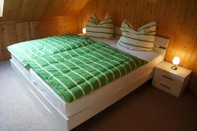 Ein Bett oder Betten in einem Zimmer der Unterkunft Schorfheider Ferienwohnung