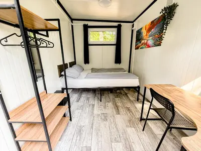 Ein Bett oder Betten in einem Zimmer der Unterkunft EASY Lodges Berlin