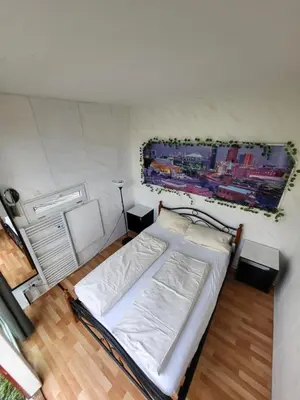 Ein Bett oder Betten in einem Zimmer der Unterkunft EASY Lodges Berlin