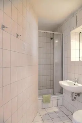 Ein Badezimmer in der Unterkunft Hotel am Liepnitzsee