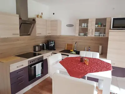 Küche/Küchenzeile in der Unterkunft Ferienhaus Fichtenwalde