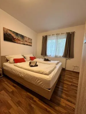 Ein Bett oder Betten in einem Zimmer der Unterkunft Ferienhaus Fichtenwalde