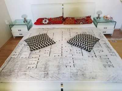 Ein Bett oder Betten in einem Zimmer der Unterkunft Pension Am Mellensee