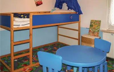 Ein Etagenbett oder Etagenbetten in einem Zimmer der Unterkunft Two-Bedroom Holiday Home In Neue Muhle