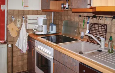 Küche/Küchenzeile in der Unterkunft Two-Bedroom Holiday Home In Neue Muhle
