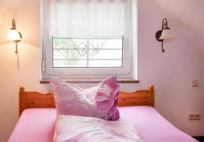 Ein Bett oder Betten in einem Zimmer der Unterkunft Spreewaldpension Andreas Krüger