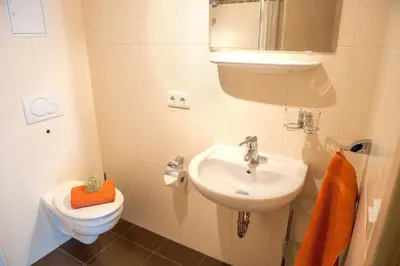 Ein Badezimmer in der Unterkunft Ferienappartements Am Spreewaldfliess