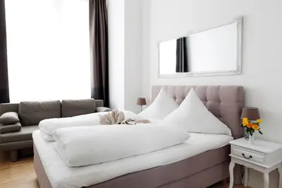 Ein Sitzbereich in der Unterkunft SC 02 by ROCKCHAIR Apartments l SUPERHOST Status l 4 Bedrooms Boxspringbeds 2 Bathrooms Balcony Elevator - Cozy Family & Business Flair welcomes you!