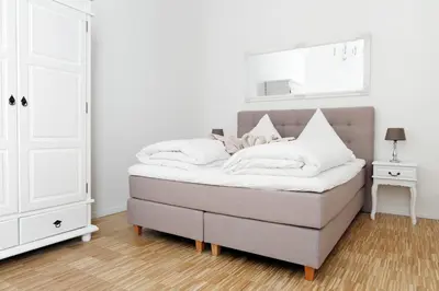 Ein Bett oder Betten in einem Zimmer der Unterkunft SC 02 by ROCKCHAIR Apartments l SUPERHOST Status l 4 Bedrooms Boxspringbeds 2 Bathrooms Balcony Elevator - Cozy Family & Business Flair welcomes you!